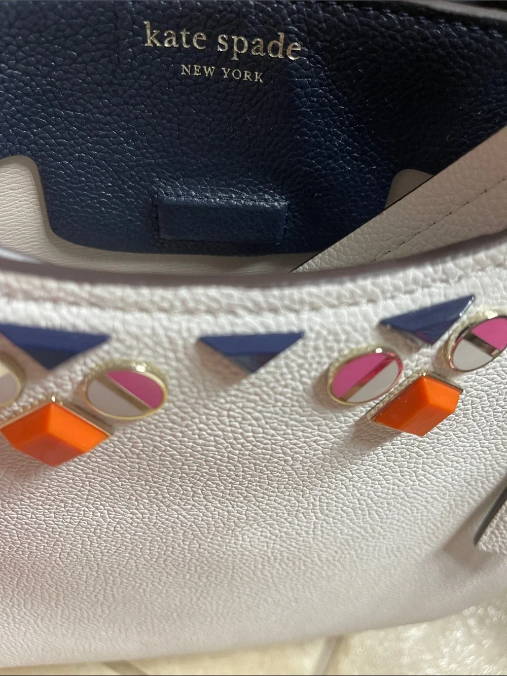 kate spade cream leather